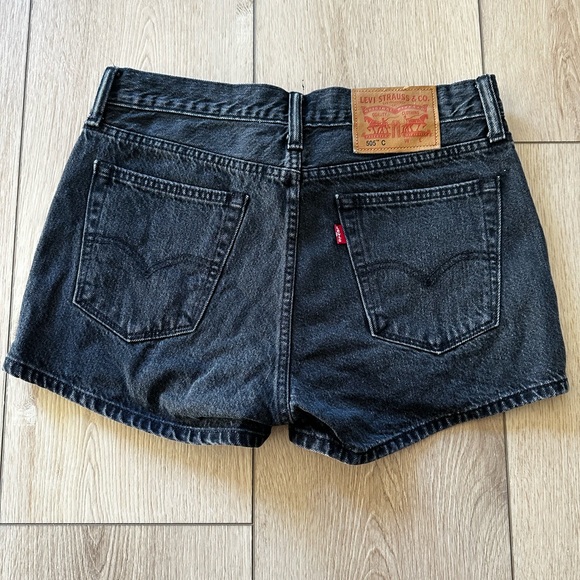 Levi’s black denim shorts with zipper side slits Size 28 - Picture 1 of 4